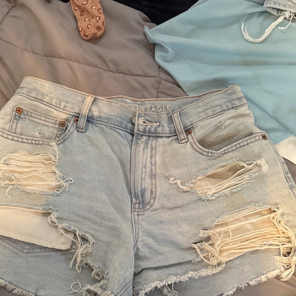 American Eagle Outfitters Ripped Light Blue Jean Shorts